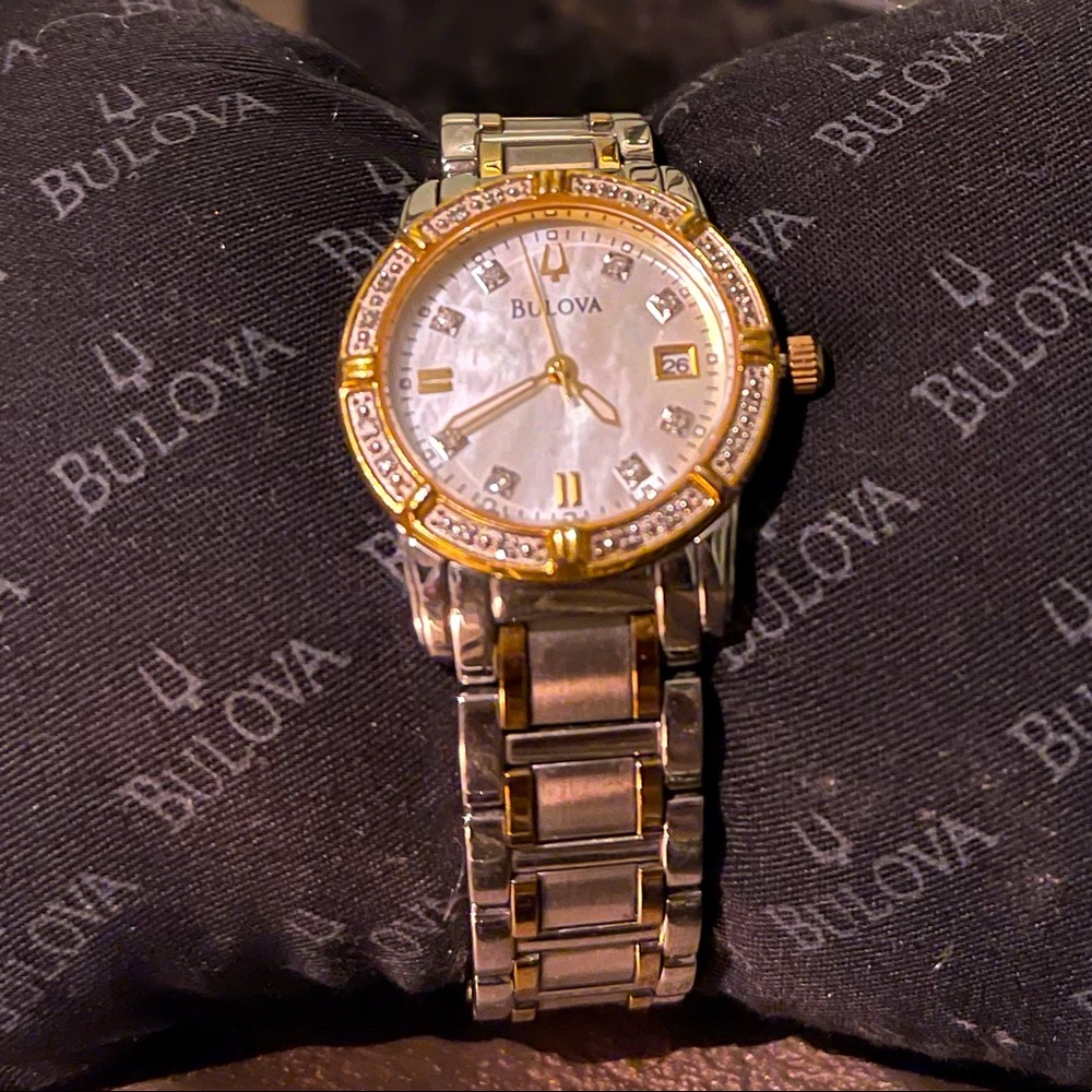 Used women’s Bulova watch silver,gold and diamonds
